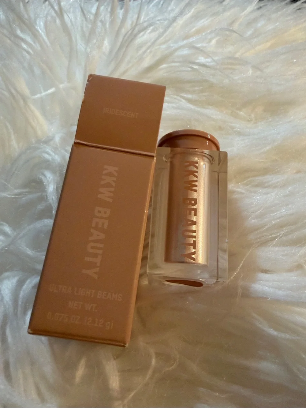 KKW Beauty loose eye shadow color: iridescent